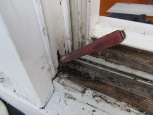 rotted wood window, water leak