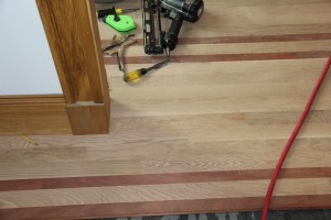 Hardwood floor border and feature strip