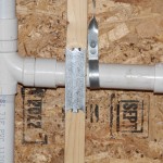 A Nail Protection Plate helps prevent nails from piercing pipes and electrical lines after the plaster walls are installed and the finish trim is being applied.
