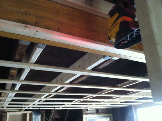How to use metal studs for strapping and leveling a ceiling 8