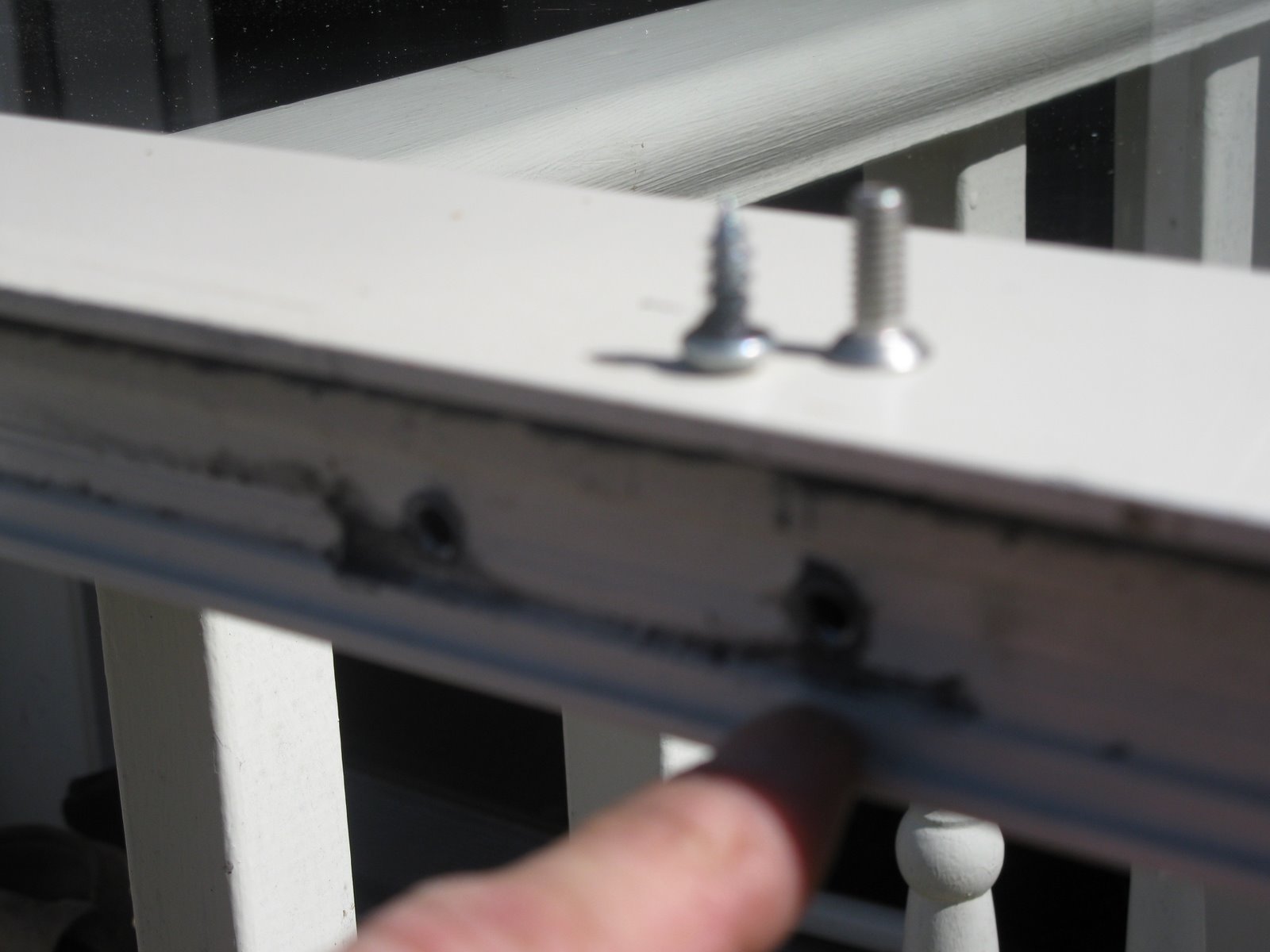 How do you repair a storm door hinge?