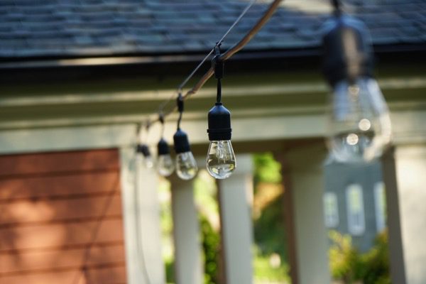Using A Cable To Hang String Lights, How To Hang Outdoor String Lights On Brick Wall