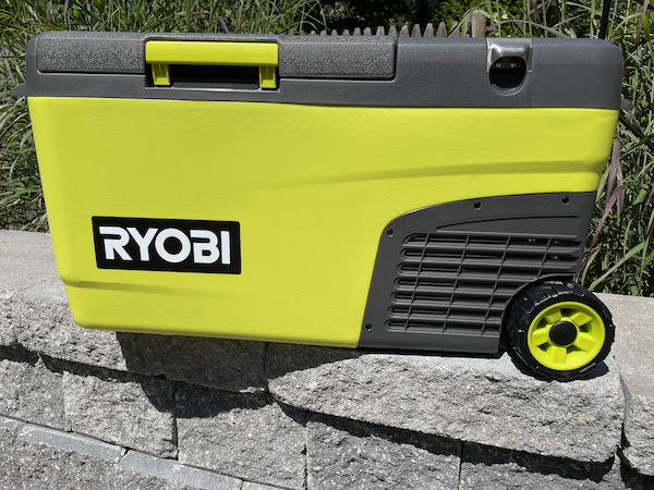Ryobi Hybrid Cooler atop a patio wall.
