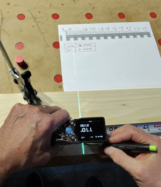A picture of the XTape creating stake out lines on an actual project.